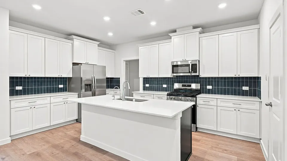A kitchen in a Empire Homes home
